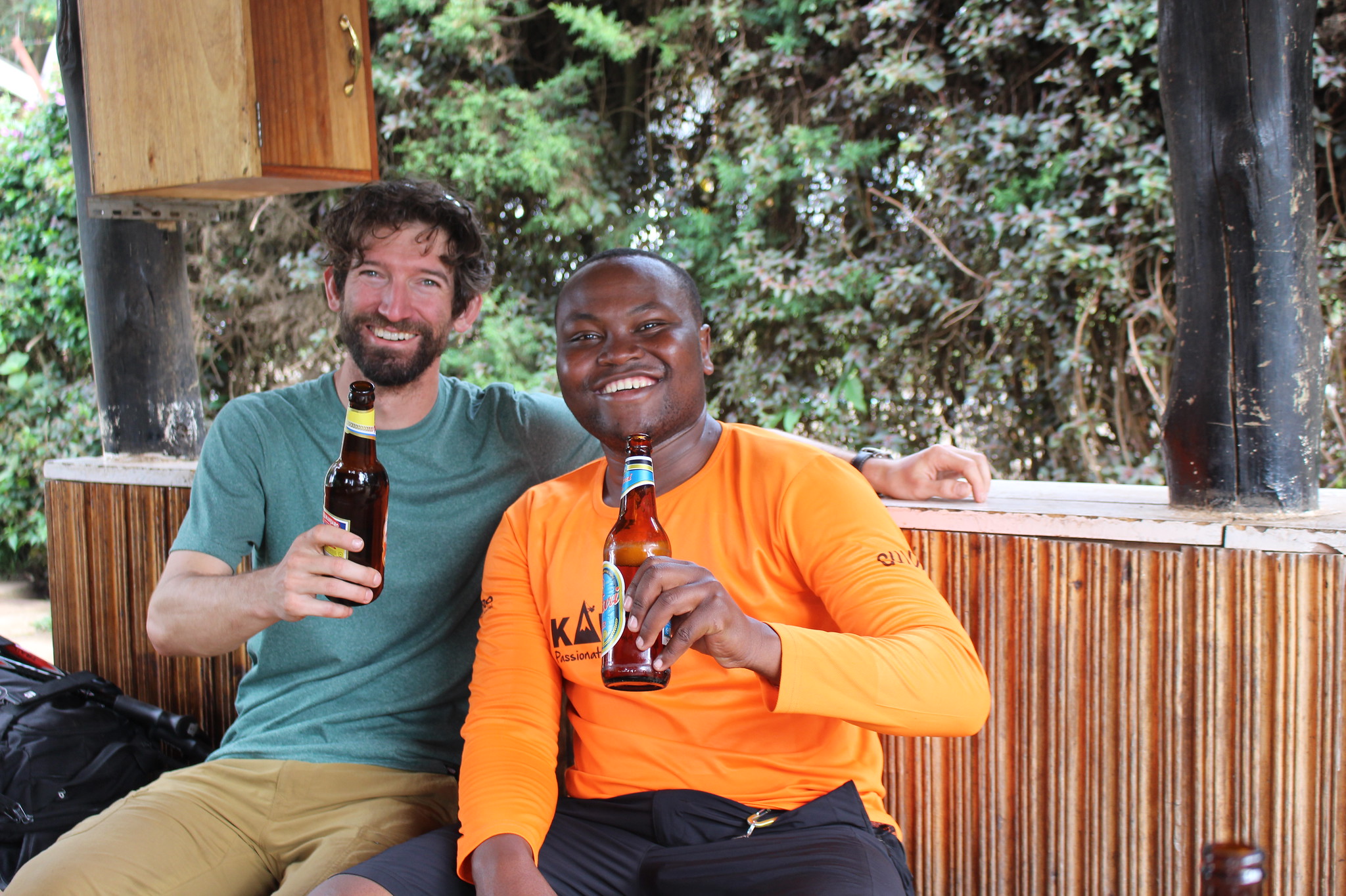 Having beer at Kilimanjaro gate