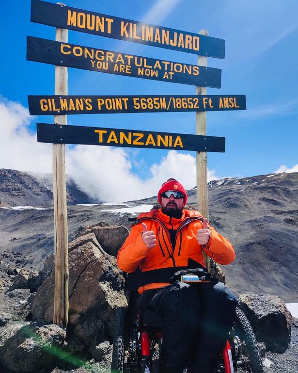 Manchester United supporter climbs Kilimanjaro on a wheelchair