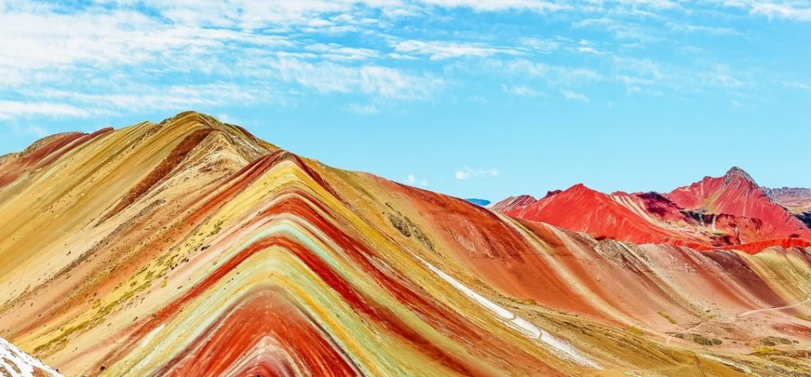 Pride of Rainbow Mountains in Peru and China, nature's palette of colours